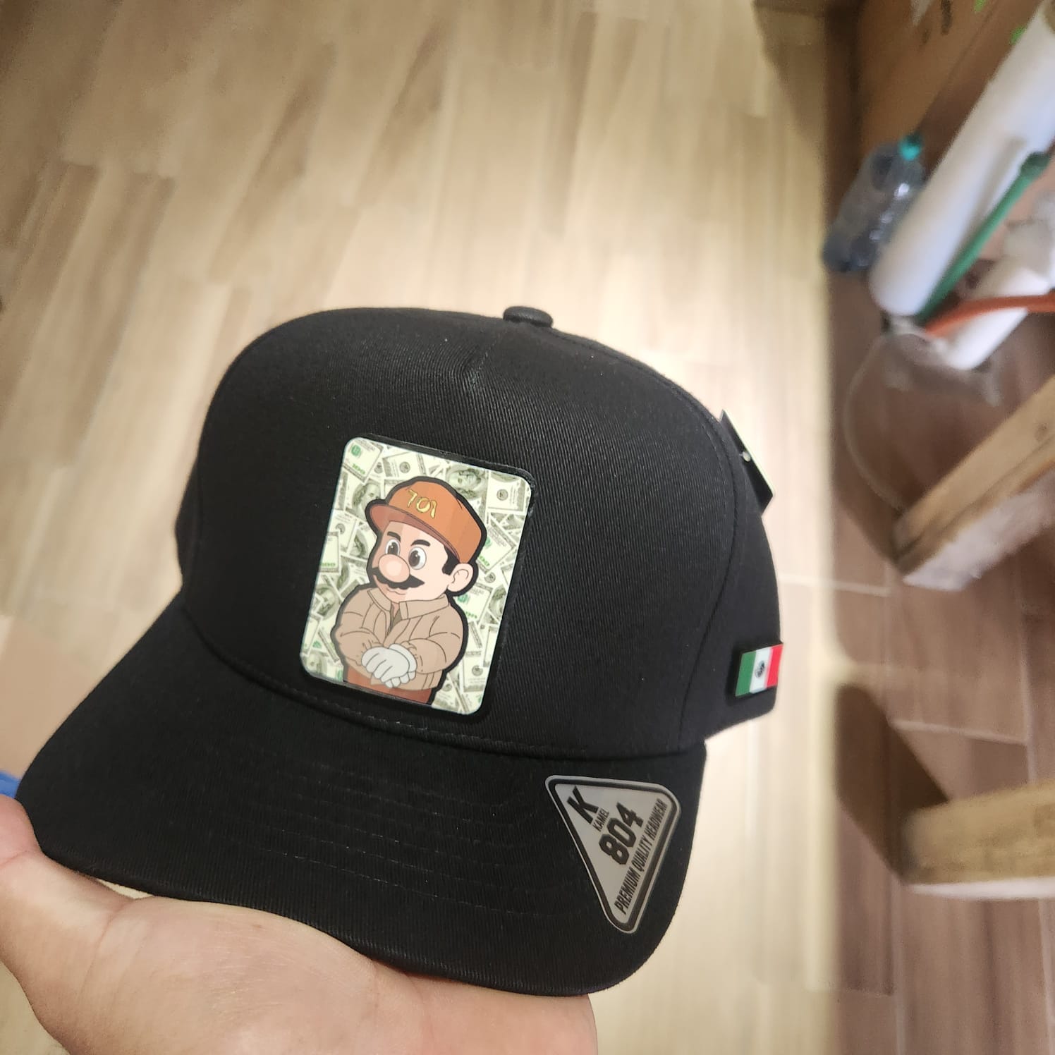 EL CHAPOBROS Y LOS DOLARES CUADRO PLACA KAMEL