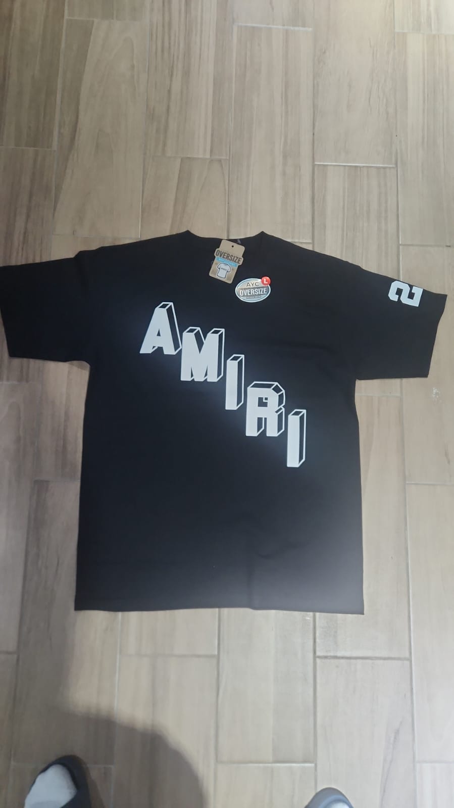 AMIRI LETRAS BLANCA DIAGONAL