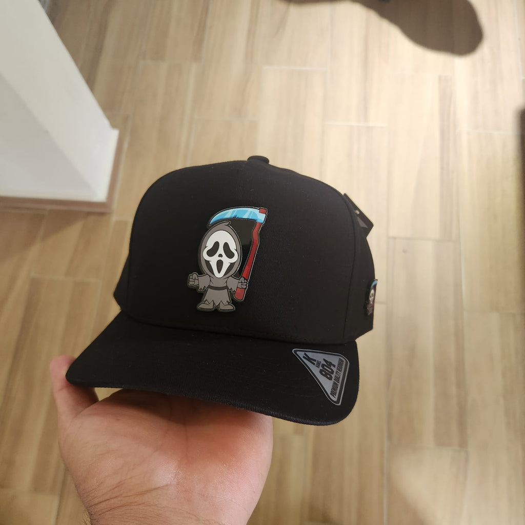FANTASMA Y ACHA GORRA NEGRA PLACA KAMEL