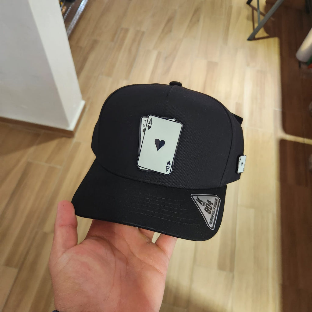 CARTA PAR JA GORRA NEGRA PLACA KAMEL