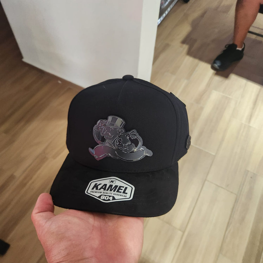MONOPOLY DINERO GORRA NEGRA PLACA KAMEL