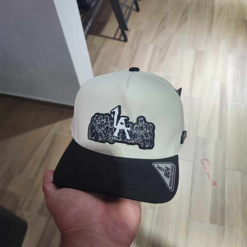 LA ULTIMA CENA GORRA BEIGE VICERA NEGRA PLACA KAMEL