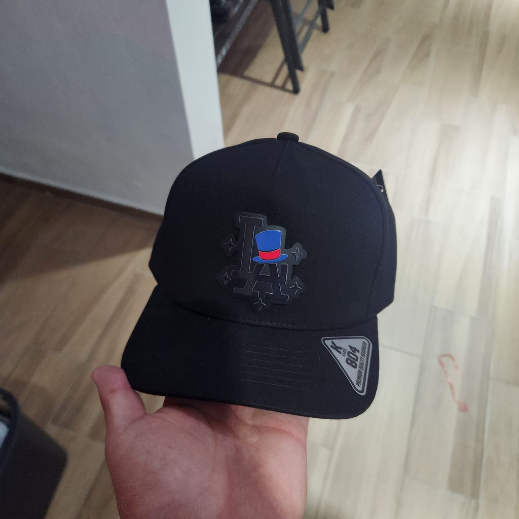 LA MAGO SOMBRERO ESTRELLAS GORRA NEGRA PLACA KAMEL